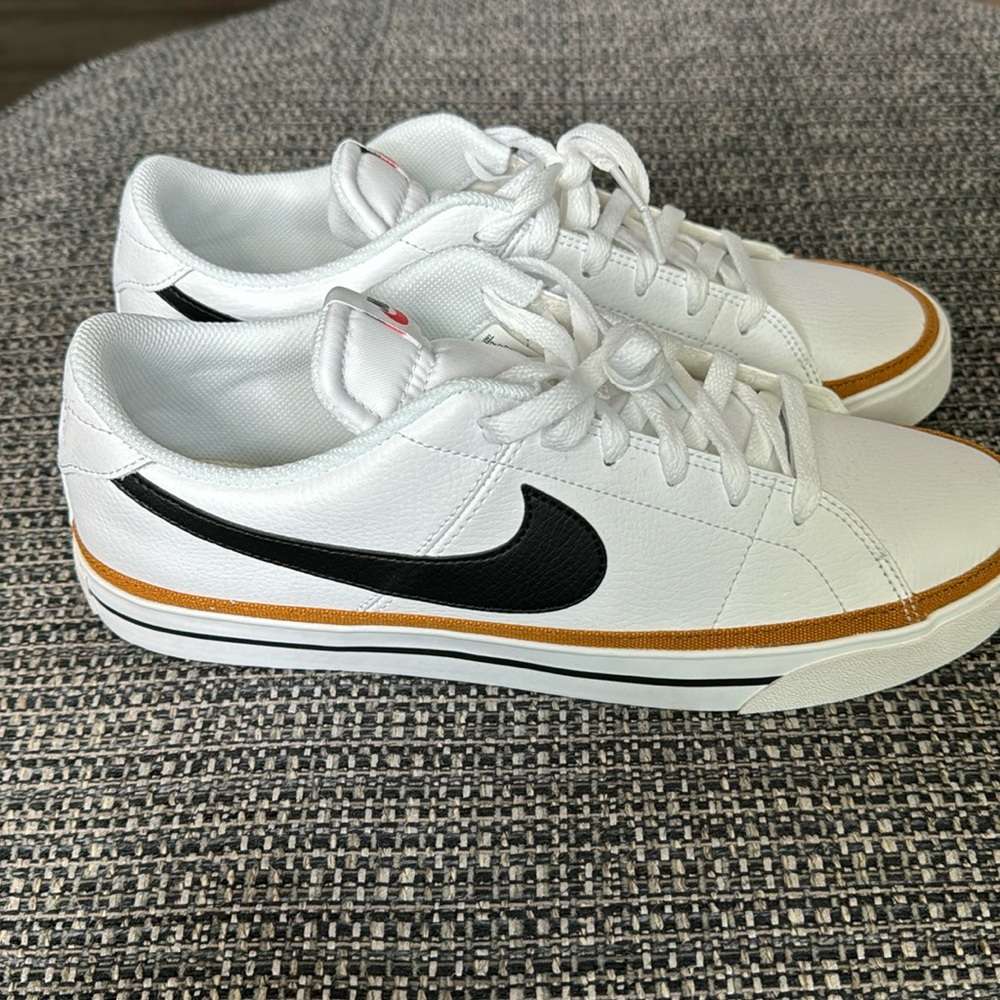 Nike Women's White Leather Sneakers with Black Swoosh and Tan Accent